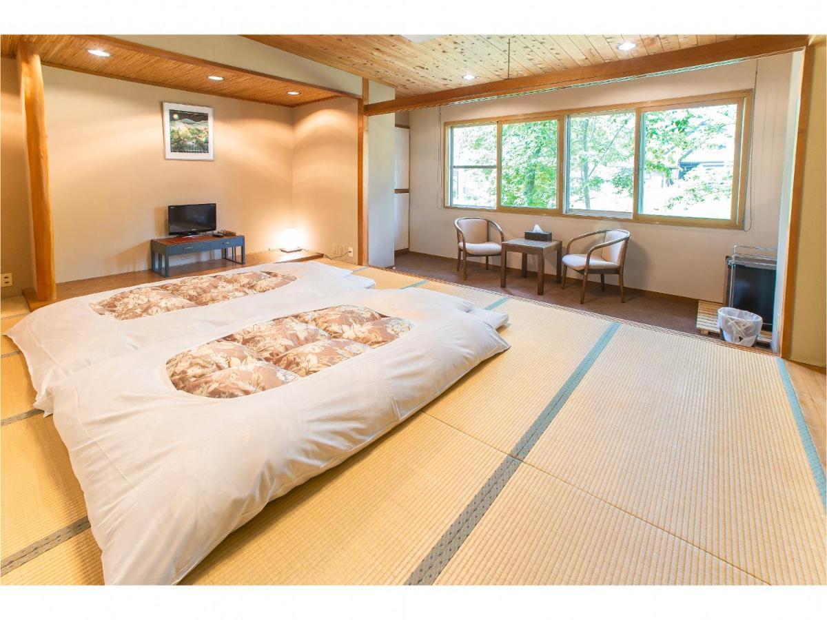 Bed and Breakfast Nomad Хакуба-Мура Экстерьер фото